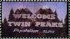 welcome sign to twin peaks that says 'welcome twin peaks'