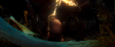 ventress on the ground with a beam of light bursting out of her mouth and face and gathering in a cloud in the air above her